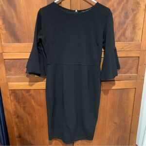 Boohoo dress short sleeve pencil type with mid sleeves. Size is 8